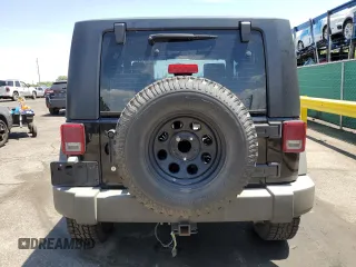 2009 Jeep Wrangler X z VIN 1J4FA24179L716499, wystawiony jako Copart lot #58342675 z przebiegiem 116 871 mil mil oraz Szkoda całkowita • Salvage title. Historia ofert i sprzedaży dostępna na DreamBid. Obrazek 6.
