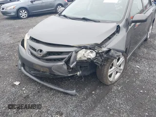 2013 Toyota Corolla L with VIN 2T1BU4EE7DC061656, listed as a IAAI auction lot 42169502 with 182,402 mi miles and . Bid and sale history available at DreamBid. Image 6.