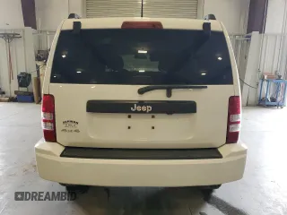 2010 Jeep Liberty Sport with VIN 1J4PN2GK2AW115064, listed as a Copart auction lot 57344645 with 114,275 mi miles and Salvage title. Bid and sale history available at DreamBid. Image 6.