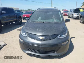 2018 Chevrolet Bolt EV Premier z VIN 1G1FX6S04J4116505, wystawiony jako IAAI lot #42258808 z przebiegiem 103 089 mil mil oraz . Historia ofert i sprzedaży dostępna na DreamBid. Obrazek 13.