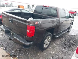 2016 Chevrolet Silverado 1500 LT with VIN 3GCUKREC1GG197043, listed as a IAAI auction lot 41953001 with 181,124 mi miles. Bid and sale history available at carsss.com. Image 4.