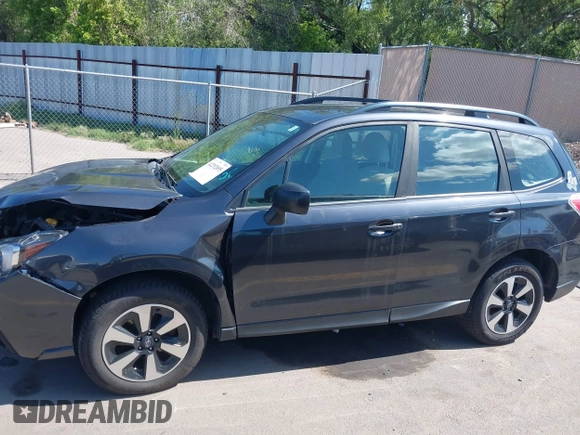 2018 Subaru Forester z VIN JF2SJABC1JH460419, wystawiony jako IAAI lot #42292895 z przebiegiem 141 486 mil mil oraz . Historia ofert i sprzedaży dostępna na DreamBid. Obrazek 14.