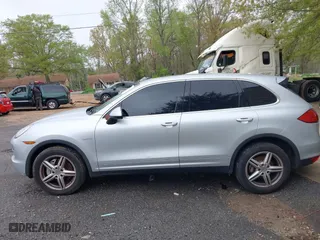 2012 Porsche Cayenne S Hybrid with VIN WP1AE2A2XCLA90082, listed as a IAAI auction lot 41960714 with 139,081 mi miles. Bid and sale history available at carsss.com. Image 15.