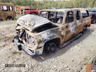 1988 Chevrolet Suburban z VIN 1GNGR26N5JF156172, wystawiony jako Copart lot #74486264 z przebiegiem Nie podano mil oraz Szkoda całkowita • Salvage title. Historia ofert i sprzedaży dostępna na DreamBid. Obrazek 1.