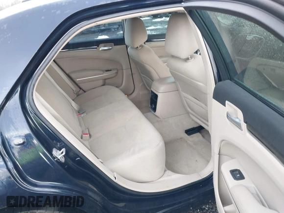 2012 Chrysler 300 with VIN 2C3CCAAG7CH142422, listed as a IAAI auction lot 41555202 with 134,864 mi miles and . Bid and sale history available at DreamBid. Image 8.
