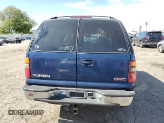 2001 GMC Yukon SLT z VIN 1GKEC13T21J264040, wystawiony jako Copart lot #46282145 z przebiegiem 136 264 mil mil oraz Szkoda całkowita • Salvage title. Historia ofert i sprzedaży dostępna na DreamBid. Obrazek 6.