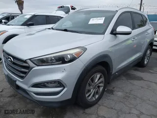 2016 Hyundai Tucson SE with VIN KM8J33A47GU242183, listed as a IAAI auction lot 41772964 with 97,527 mi miles. Bid and sale history available at carsss.com. Image 2.