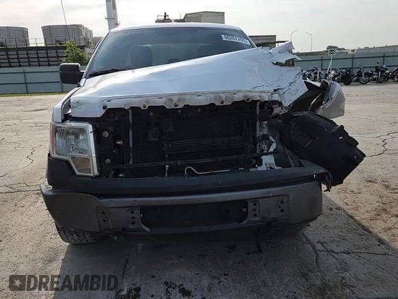 2013 Ford F-150 XL с VIN 1FTFX1CF9DKG47521, выставлен на аукционе Copart как лот 60262495 с пробегом 300 728 миль миль и Списание • Salvage title. История ставок и продаж доступна на DreamBid. Изображение 14.