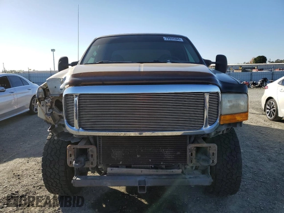 2000 Ford Super Duty F-250 XL with VIN 1FTNW21S9YEA79229, listed as a Copart auction lot 79939304 with 276,795 mi miles and Salvage Title. Bid and sale history available at carsss.com. Image 5.