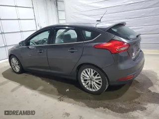 2015 Ford Focus Titanium with VIN 1FADP3N2XFL321128, listed as a Copart auction lot 50796845 with 156,700 mi miles and Clean Title. Bid and sale history available at carsss.com. Image 2.