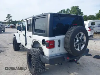 2018 Jeep Wrangler Unlimited Sahara z VIN 1C4HJXEG4JW220092, wystawiony jako IAAI lot #40522478 z przebiegiem 90 529 mil mil oraz . Historia ofert i sprzedaży dostępna na DreamBid. Obrazek 3.
