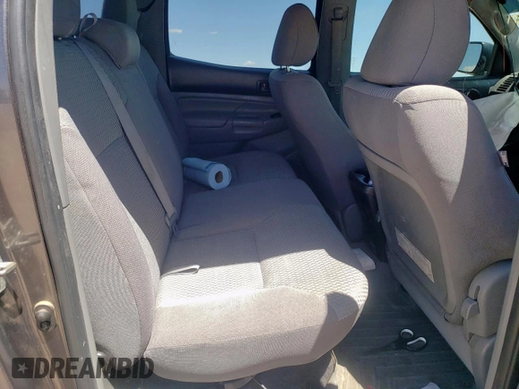 2013 Toyota Tacoma PreRunner z VIN 3TMJU4GN1DM139803, wystawiony jako Copart lot #57836825 z przebiegiem 138 899 mil mil oraz Szkoda całkowita • Salvage title. Historia ofert i sprzedaży dostępna na DreamBid. Obrazek 10.