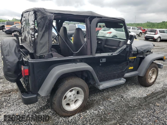 2002 Jeep Wrangler Sport with VIN 1J4FA49S12P730135, listed as a Copart auction lot 54477835 with 148,153 mi miles and Salvage title. Bid and sale history available at DreamBid. Image 3.