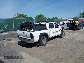 2013 Toyota Tacoma with VIN 3TMLU4EN9DM113137, listed as a IAAI auction lot 41709140 with 57,704 mi miles and . Bid and sale history available at DreamBid. Image 4.