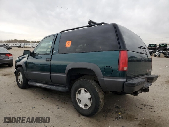 1998 Chevrolet Tahoe z VIN 3GNEK18R4WG128424, wystawiony jako Copart lot #79684984 z przebiegiem 217 456 mil mil oraz Szkoda całkowita • Salvage title. Historia ofert i sprzedaży dostępna na DreamBid. Obrazek 2.
