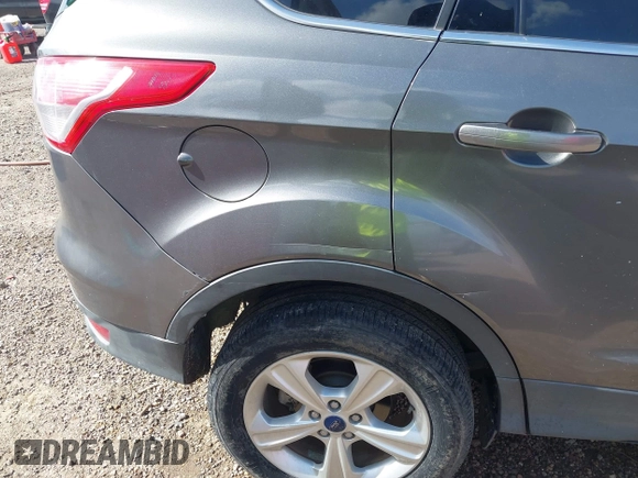 2013 Ford Escape SE with VIN 1FMCU0GX4DUD68468, listed as a IAAI auction lot 42715806 with 95,236 mi miles and . Bid and sale history available at DreamBid. Image 6.