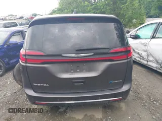 2023 Chrysler Pacifica Hybrid Touring L with VIN 2C4RC1L72PR540902, listed as a IAAI auction lot 42151047 with Not Provided miles and . Bid and sale history available at DreamBid. Image 15.