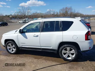 2015 Jeep Compass Latitude with VIN 1C4NJDEB7FD120738, listed as a IAAI auction lot 41878045 with 128,393 mi miles. Bid and sale history available at carsss.com. Image 14.