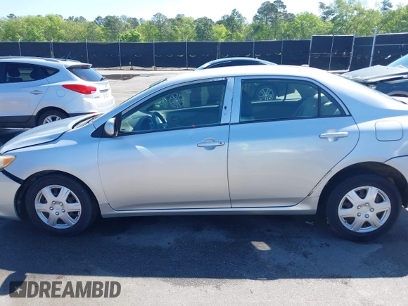 2009 Toyota Corolla with VIN 1NXBU40E99Z100681, listed as a IAAI auction lot 41973116 with 119,744 mi miles. Bid and sale history available at carsss.com. Image 14.