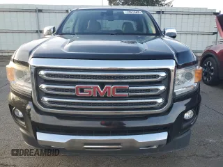 2015 GMC Canyon 4WD SLT z VIN 1GTG6CE34F1121540, wystawiony jako Copart lot #86190774 z przebiegiem 141 381 mil mil oraz Czysty tytuł • Clean title. Historia ofert i sprzedaży dostępna na DreamBid. Obrazek 5.