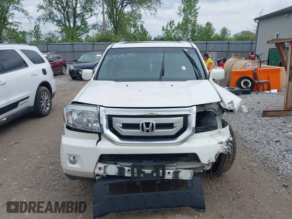 2011 Honda Pilot Touring z VIN 5FNYF4H96BB106873, wystawiony jako IAAI lot #42154795 z przebiegiem 162 282 mil mil oraz . Historia ofert i sprzedaży dostępna na DreamBid. Obrazek 12.
