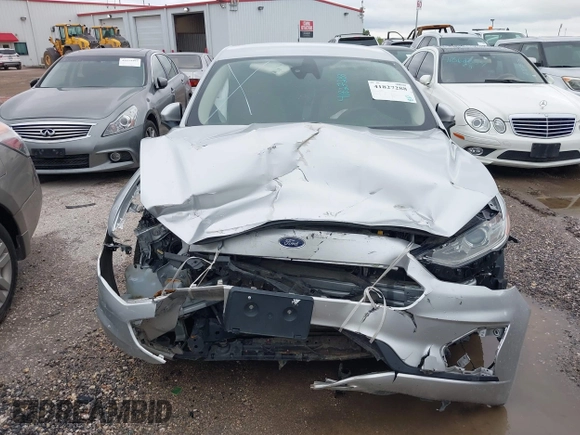 2019 Ford Fusion S with VIN 3FA6P0G71KR275393, listed as a IAAI auction lot 41827288 with 108,160 mi miles and . Bid and sale history available at DreamBid. Image 12.