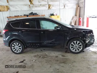 2017 Ford Escape Titanium with VIN 1FMCU0JD2HUE71179, listed as a IAAI auction lot 41465849 with 95,426 mi miles. Bid and sale history available at carsss.com. Image 13.