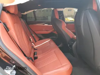 2021 BMW X4 M z VIN 5YMUJ0C01M9H09798, wystawiony jako Copart lot #47921083 z przebiegiem 32 940 mil mil oraz . Historia ofert i sprzedaży dostępna na DreamBid. Obrazek 11.
