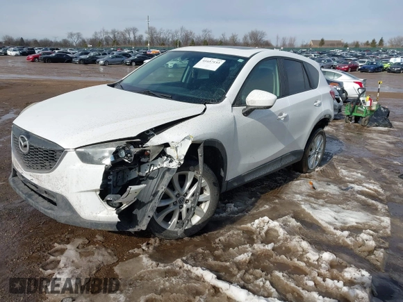 2014 Mazda CX-5 Grand Touring with VIN JM3KE4DY9E0300491, listed as a IAAI auction lot 41657153 with 157,394 mi miles and . Bid and sale history available at DreamBid. Image 17.