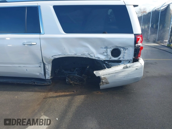 2019 Chevrolet Suburban LT with VIN 1GNSCJKC1KR146104, listed as a IAAI auction lot 41103371 with 108,727 mi miles. Bid and sale history available at carsss.com. Image 6.