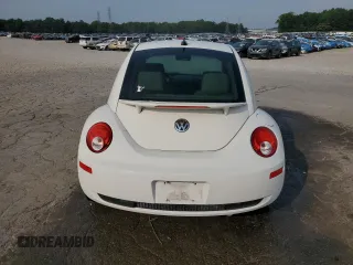 2010 Volkswagen Beetle with VIN 3VWPW3AG0AM027009, listed as a Copart auction lot 60617775 with 113,078 mi miles and Salvage title. Bid and sale history available at DreamBid. Image 6.