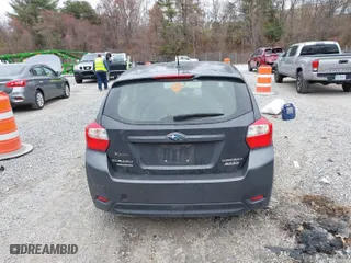 2014 Subaru Impreza Wagon 2.0i with VIN JF1GPAA60E8307721, listed as a IAAI auction lot 40900681 with 194,144 mi miles. Bid and sale history available at carsss.com. Image 17.