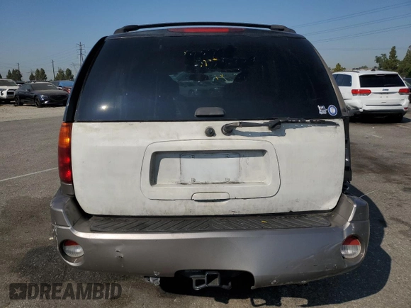 2005 GMC Envoy SLT with VIN 1GKDS13S952382088, listed as a Copart auction lot 64765154 with 177,333 mi miles and Salvage Title. Bid and sale history available at carsss.com. Image 6.
