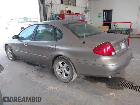 2002 Ford Taurus SES Standard with VIN 1FAFP55U32A171004, listed as a IAAI auction lot 41782261 with 105,967 mi miles. Bid and sale history available at carsss.com. Image 3.