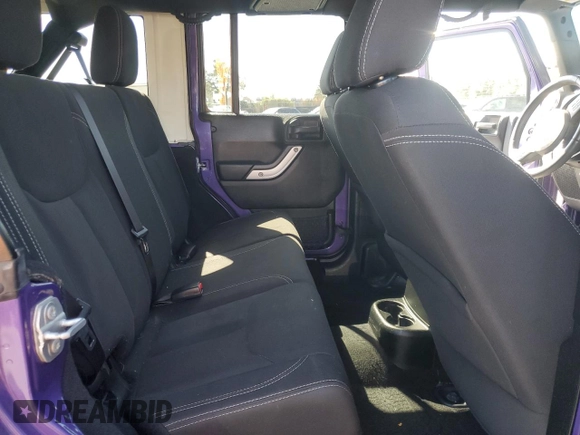 2017 Jeep Wrangler Unlimited Sahara with VIN 1C4BJWEG8HL657654, listed as a Copart auction lot 51763015 with 87,949 mi miles and Salvage Title. Bid and sale history available at carsss.com. Image 11.