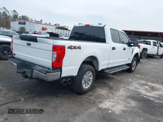 2022 Ford F-250 XL z VIN 1FT7W2BTXNEF76074, wystawiony jako IAAI lot #41339363 z przebiegiem 70 594 mil mil oraz . Historia ofert i sprzedaży dostępna na DreamBid. Obrazek 4.