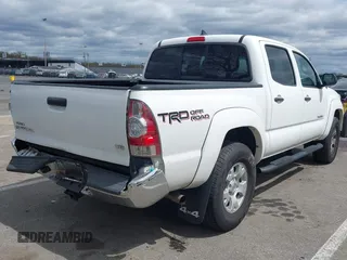 2015 Toyota Tacoma with VIN 5TFLU4EN6FX120947, listed as a IAAI auction lot 42043239 with 125,480 mi miles and . Bid and sale history available at DreamBid. Image 4.