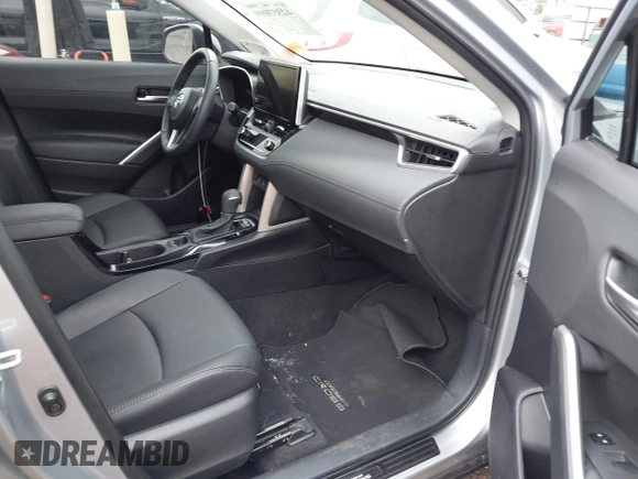 2024 Toyota Corolla Cross XLE with VIN 7MUDAAAGXRV090967, listed as a IAAI auction lot 42353090 with 24,970 mi miles and . Bid and sale history available at DreamBid. Image 5.