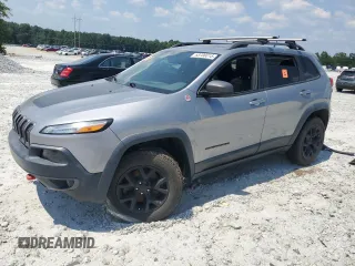 2015 Jeep Cherokee Trailhawk with VIN 1C4PJMBS3FW735398, listed as a Copart auction lot 63700015 with 157,123 mi miles and Clean title. Bid and sale history available at DreamBid. Image 1.