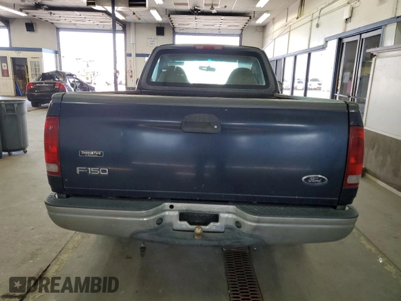 2003 Ford F-150 XL with VIN 1FTRF17293NA60031, listed as a Copart auction lot 55433885 with 186,557 mi miles and Salvage title. Bid and sale history available at DreamBid. Image 6.