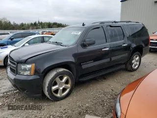 2011 Chevrolet Suburban LT z VIN 1GNSKJE37BR272949, wystawiony jako Copart lot #55329935 z przebiegiem 211 997 mil mil oraz Nie do naprawy • Non repairable. Historia ofert i sprzedaży dostępna na DreamBid. Obrazek 1.