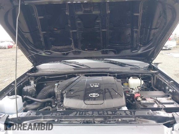 2013 Toyota Tacoma with VIN 3TMLU4ENXDM105967, listed as a IAAI auction lot 41819211 with 121,012 mi miles and . Bid and sale history available at DreamBid. Image 10.