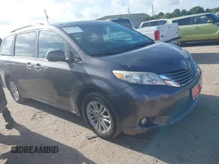 2015 Toyota Sienna XLE with VIN 5TDYK3DC0FS584392, listed as a IAAI auction lot 42721040 with 220,151 mi miles and . Bid and sale history available at DreamBid. Image 1.