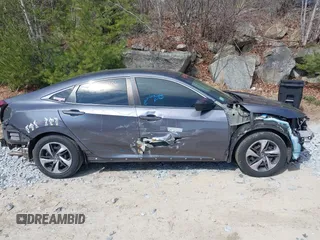 2020 Honda Civic LX with VIN 2HGFC2F6XLH509250, listed as a IAAI auction lot 41904206 with 52,583 mi miles and . Bid and sale history available at DreamBid. Image 6.