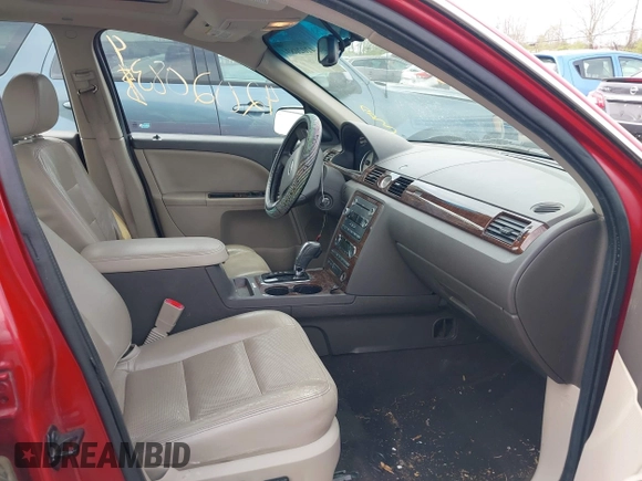 2009 Ford Taurus Limited with VIN 1FAHP25W39G111479, listed as a IAAI auction lot 42020834 with 273,704 mi miles. Bid and sale history available at carsss.com. Image 5.