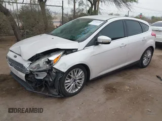 2016 Ford Focus Titanium with VIN 1FADP3N27GL319497, listed as a IAAI auction lot 42385359 with Not provided miles and . Bid and sale history available at DreamBid. Image 16.