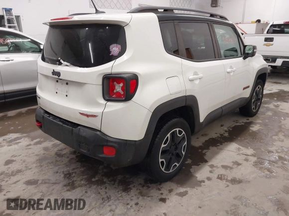 2015 Jeep Renegade Trailhawk with VIN ZACCJBCT2FPC33277, listed as a IAAI auction lot 41571863 with 98,912 mi miles and . Bid and sale history available at DreamBid. Image 4.