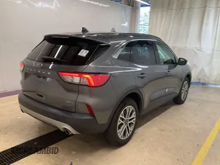 2021 Ford Escape SEL Hybrid z VIN 1FMCU9CZ7MUA83422, wystawiony jako IAAI lot #42743365 z przebiegiem 70 851 mil mil oraz . Historia ofert i sprzedaży dostępna na DreamBid. Obrazek 10.