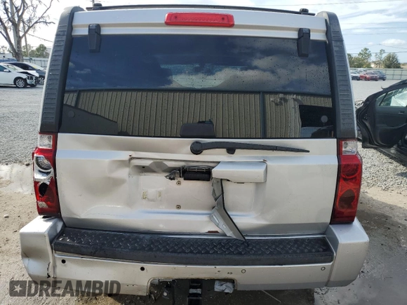 2006 Jeep Commander with VIN 1J8HH48K96C289162, listed as a Copart auction lot 80979074 with 170,581 mi miles and Salvage title. Bid and sale history available at DreamBid. Image 6.