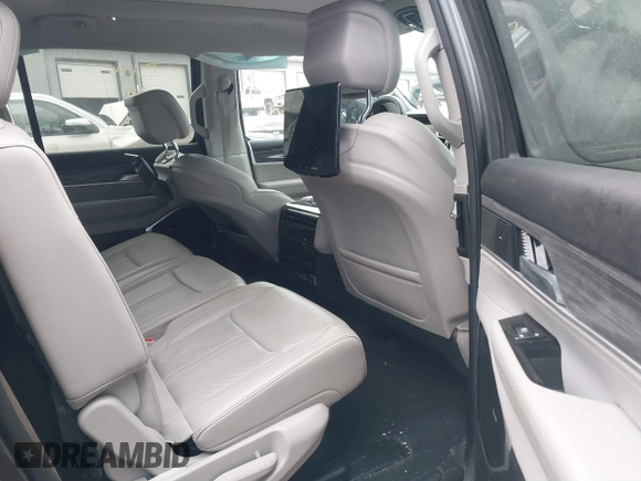2022 Jeep Wagoneer Series III with VIN 1C4SJVDT8NS151011, listed as a IAAI auction lot 41504604 with 54,212 mi miles and . Bid and sale history available at DreamBid. Image 8.